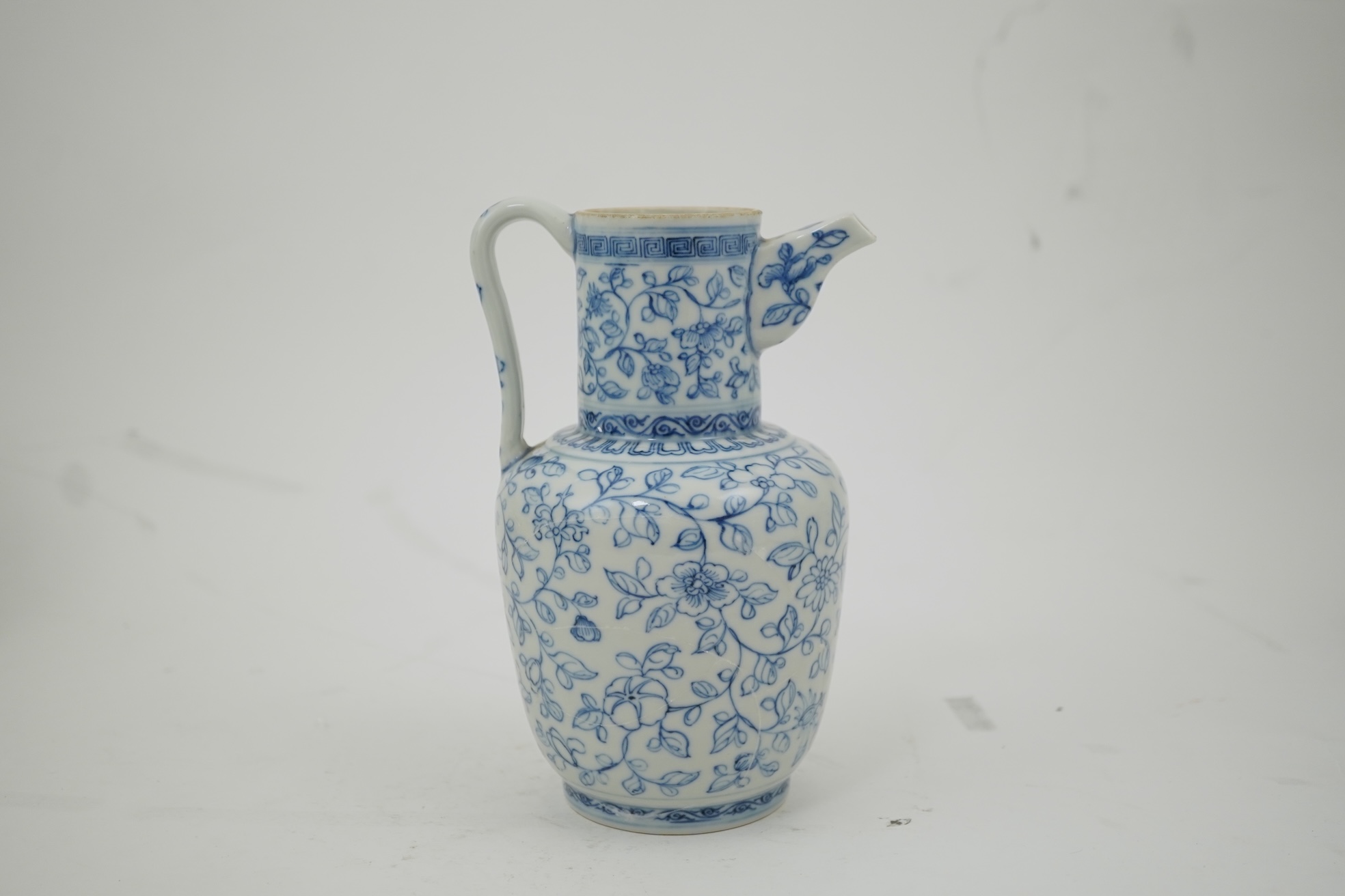 A Chinese blue and white ewer, Hongzhi mark, probably Qing dynasty